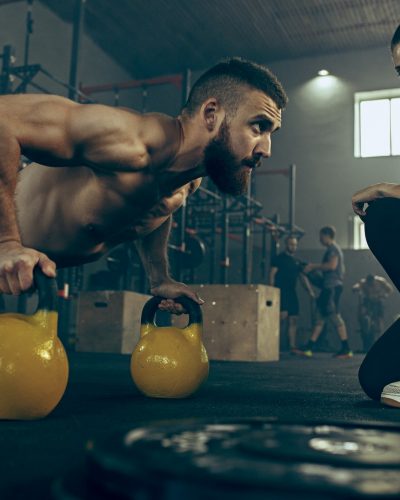 fit-young-man-lifting-barbells-working-out-in-a-gym.jpg fit-young-man-lifting-barbells-working-out-in-a-gym.jpg